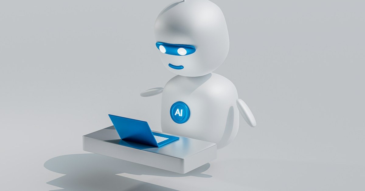 Pequeno robô de inteligência artificial branco com um notebook